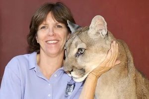 Image of Mollie Hogan and a mountain lion.
