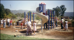 Image of the installation of playground equipment in 1989.