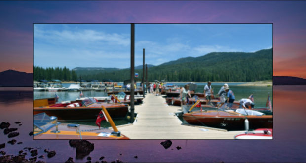 Image of boats berthed at the dock at Bass Lake.