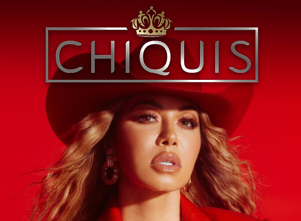 Image of Chiquis in a red cowboy hat