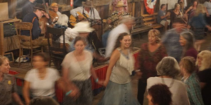 image of people dancing in a barn