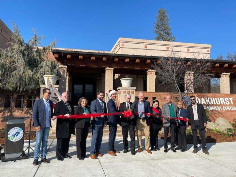 Image of people cutting ribbon for Government Services Building in Oakhurst
