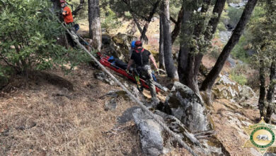 suspicious vehicle MCSO Search and Rescue team members prepare to recover a body