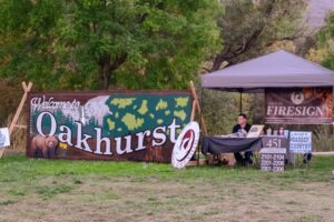 The newly restored Welcome To Oakhurst sign was unveiled at the Oakhurst Fall Festival this past weekend