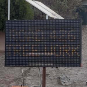 Sign announcing tree work on Road 426 in Oakhurst