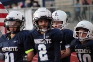 Yosemite Badgers peewee players before a game