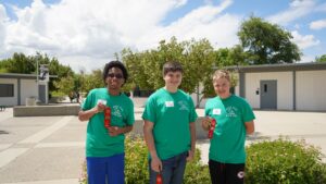 PIcture of Code Mountain Home Students who received Second place. 8th Grade Team members include Micaiah Boutard, Darian "Kova" Crump, Jaxson Lavoie.  Coached by Kim Meeks.