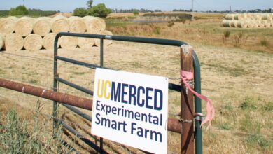 Picture of a sign stating UC Merced Experimental Smart Farm