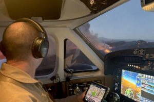 Photo of Forest Service pilot David Mundwiler flying the lead plane.