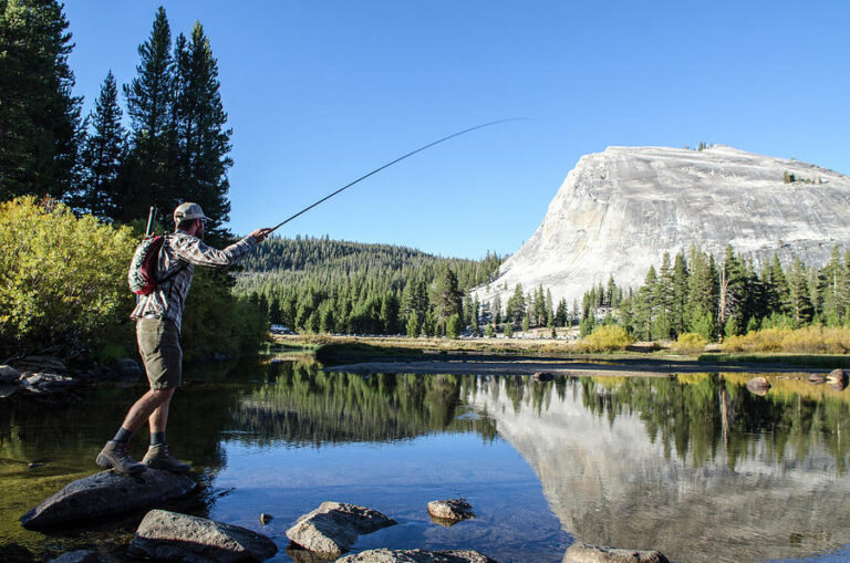 A man fishing in the Tuolumne. Photograph by Keri Oberly.