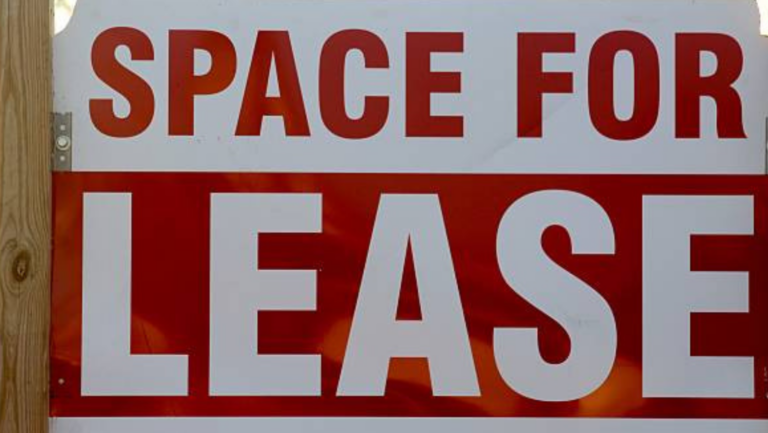 Photo of Space of Lease sign.