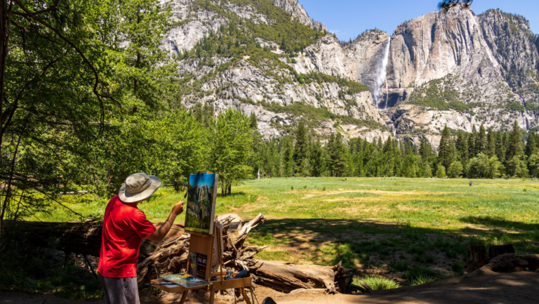 Photo of an artist painting in Yosemite.