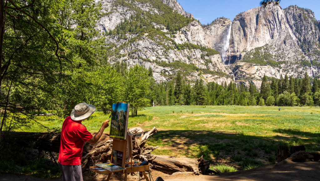 Photo of an artist painting in Yosemite.