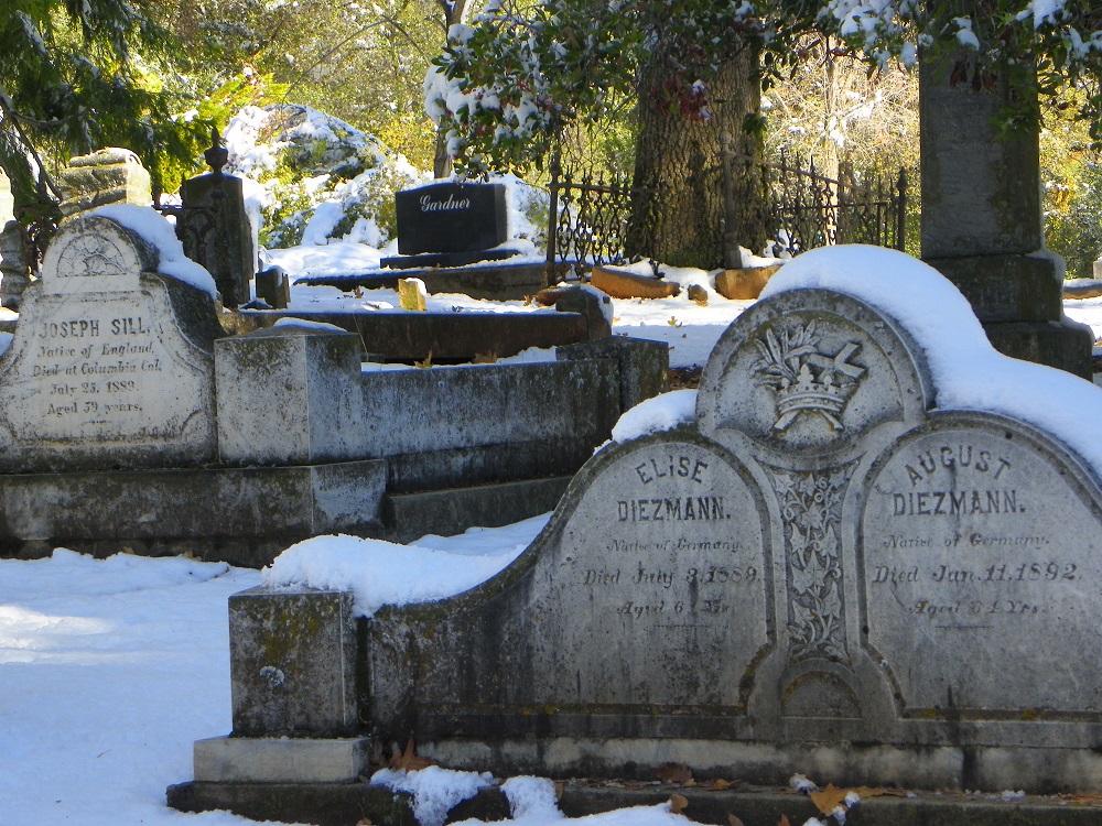 Snow covered monuments inside Columbia cemetery Dec 2013