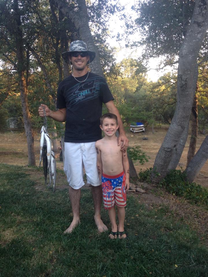 Josh Nielsen and son Logan Fishing and target practice Happy FathersDay from Stephanie - Great daddy