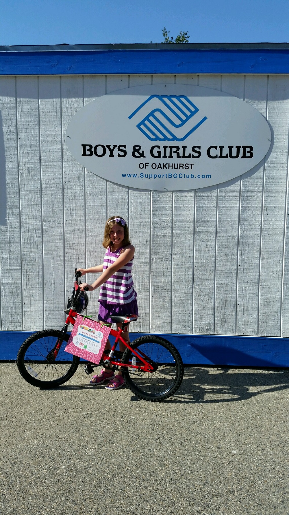 Spring BGC - Kaitlyn with bike - courtesy of BGC Peggy Decker