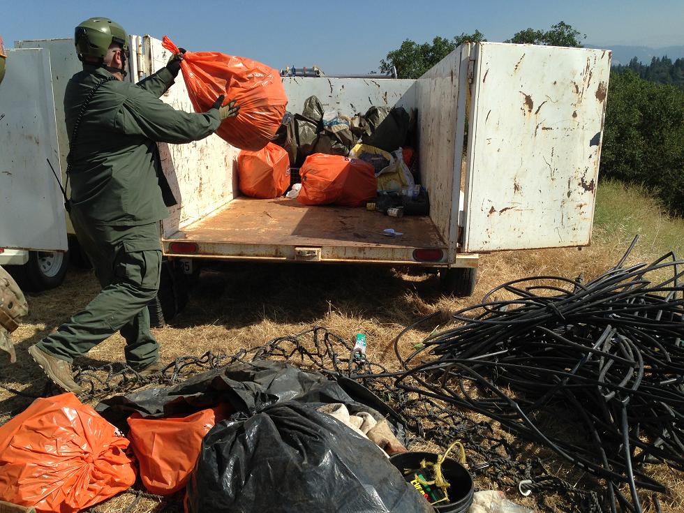 Trash into trailers - photo Madera County Sheriff
