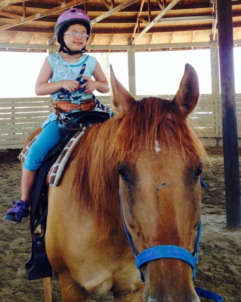 Samantha senior project 2014 child on horseback II