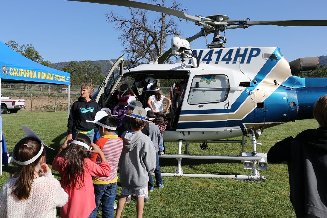 Students at Wasuma exploring CHPs H40 helicopter