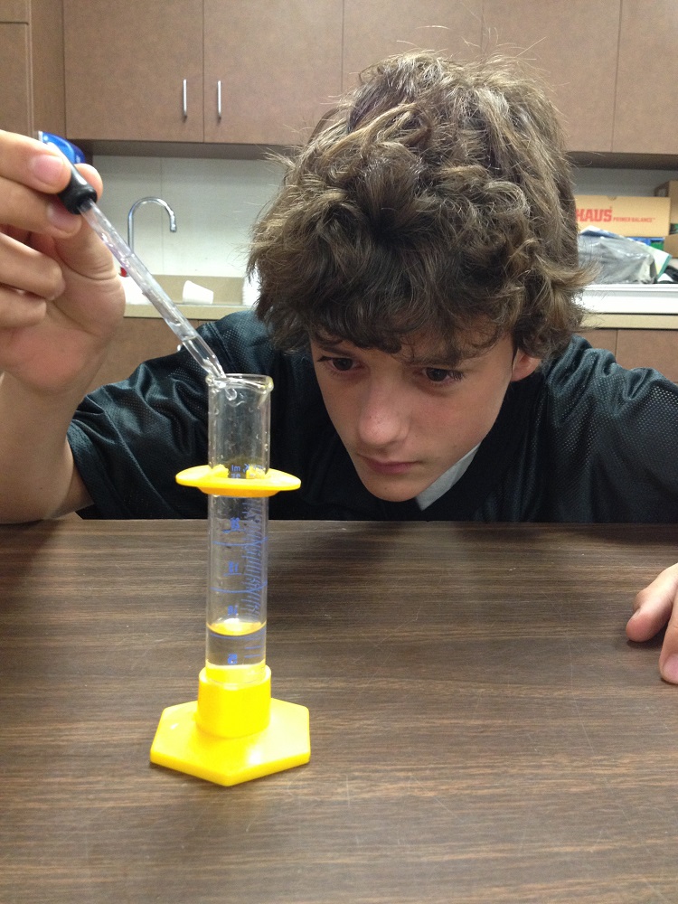 Wasuma student Cameron Miller studies in science class - Dalton Smith and Diego Combs - photo courtesy of Wasuma School