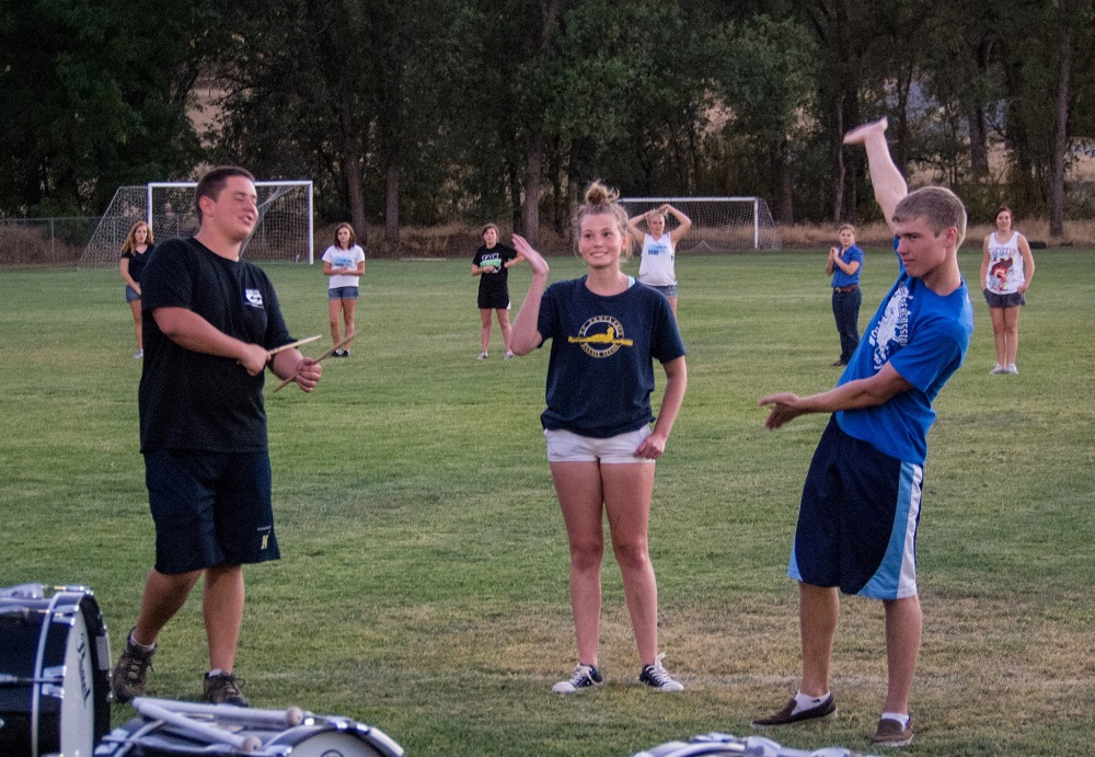 Seniors Drum Captain Jeff Foster and Drum Major Hunter Murphy with sophmore Meagan Montalto who is in training to be Drum Major - Photo by Steve Montalto