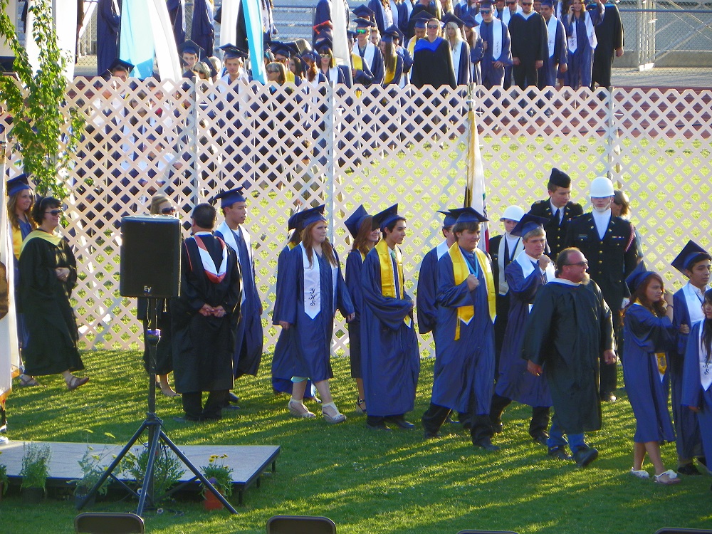 Grads enter close shot - 2014 YHS Graduation - photo by Clara Briley
