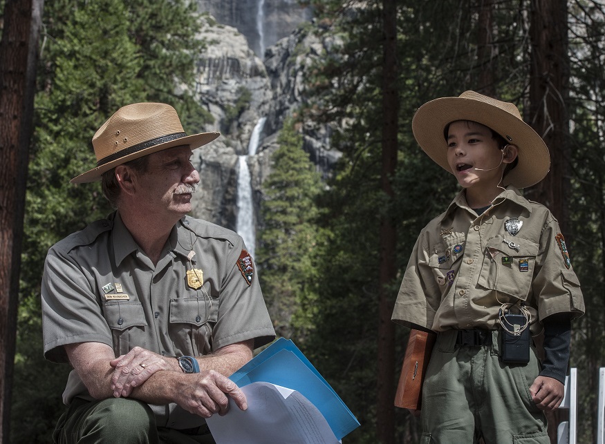 Yosemite National Park Superintendent Don Neubacher talks with Honorary Yosemite National Park Ranger Gabriel Lavan-Ying