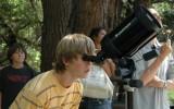 Ask A Climber program visitor with telescope - photo Yosemite Conservancy