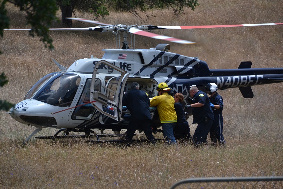 Loading patient into SkyLife after motorcycle crash