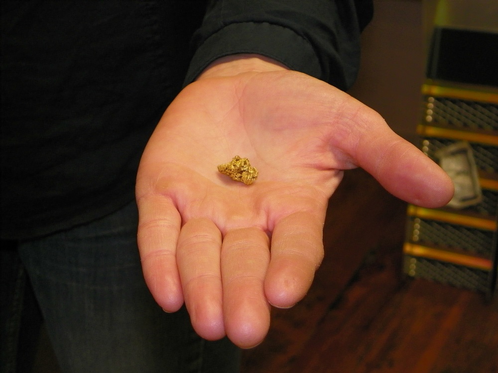 Katherine Ogilvie holds a nugget of gold - 2014 - photo by Kellie Flanagan