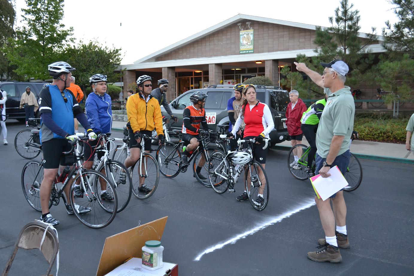 Mike Nolen talking to riders at Grizzly Century 2012 - photo Gina Clugston